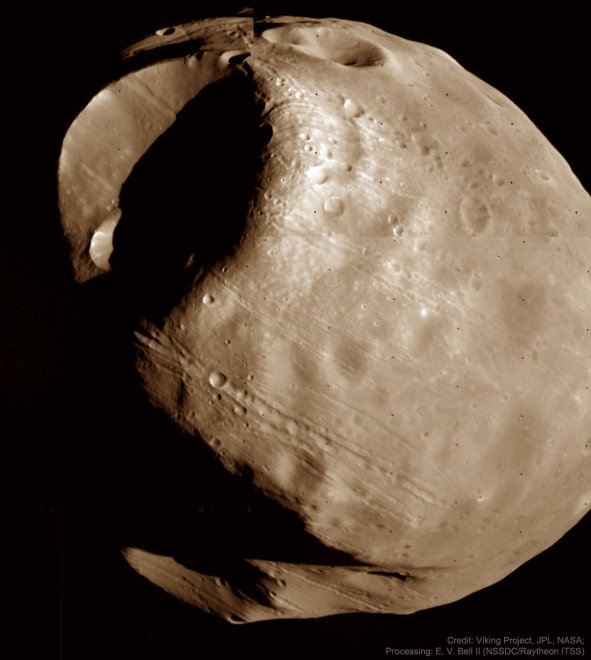 Het Marsmaantje Phobos met de grote inslagkrater Stickney linksboven (foto: NASA, Viking 1)